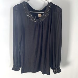 chic sweater with sparkling collar and sleeve ends